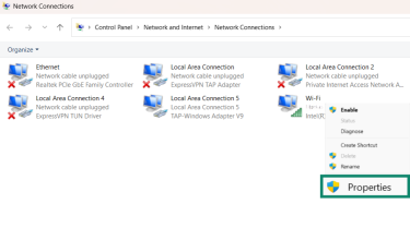 Windows Network Connections showing “Local Area Connection 2 (Disabled)” right-clicked with the context menu open and “Properties” highlighted.